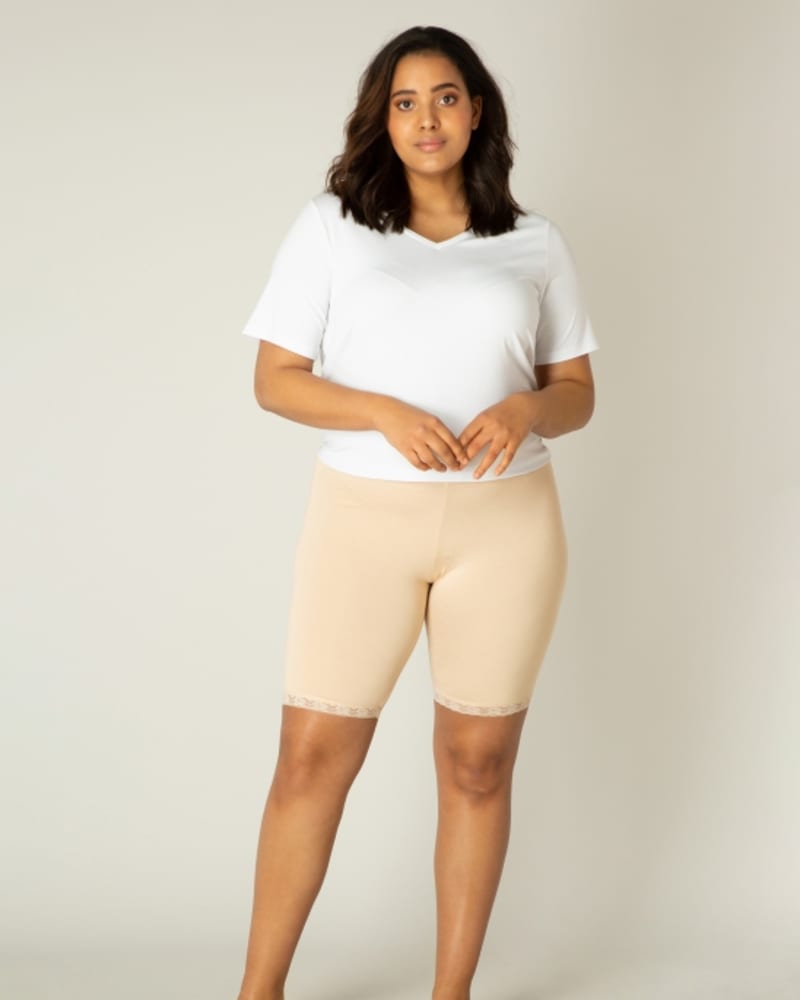 Front of a model wearing a size 5(58/60) Ava in Nude by Base Level Curvy. | dia_product_style_image_id:253233